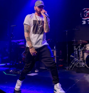Eminem Announces Daughter Hailie Jade’s Pregnancy with First Child, Shows Off ‘Grandpa’ Jersey in New Music Video