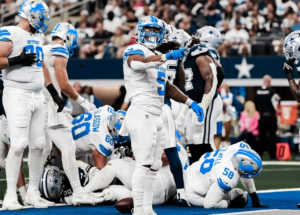 Lions Star Aidan Hutchinson, NFL Sack Leader, Carted Off with Leg Injury