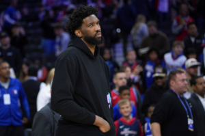 Joel Embiid of the 76ers has been suspended three-games by the NBA for shoving a newspaper columnist.