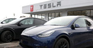 Tesla posts its first-ever annual sales drop