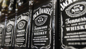 Jack Daniel’s parent Brown-Forman is cutting its workforce and closing its barrel-making plant