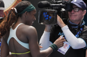 Coco Gauff writes ‘RIP TikTok USA’ on a TV camera at the Australian Open