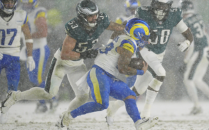 Rams’ fumbles in the snow derail playoff upset bid in Philadelphia