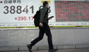 Stock market today: Asian shares gain and bitcoin hits a record high ahead of U.S. inauguration