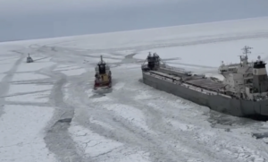 Freighter remains stuck in the ice on a frozen Lake Erie
