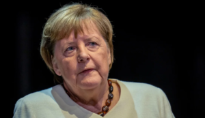 Merkel criticizes leader of her own party for cooperating with German far right