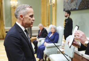 Mark Carney is sworn in as Canada’s new prime minister as country deals with Trump’s trade war