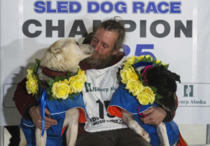 Former reality TV star Jessie Holmes wins longest-ever Iditarod Trail Sled Dog Race in Alaska