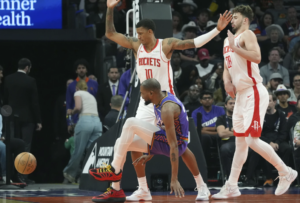 Suns star Kevin Durant helped off court after injuring left leg