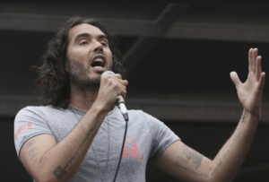 British police charge comedian Russell Brand with rape and sexual assault