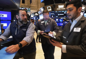 Wall Street and other markets hold steady ahead of a highly anticipated US-China meeting on trade