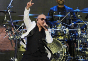 White Shirts, Black Ties, and Bald Caps: Pitbull Fans Celebrate in Clone-Style Around the Globe