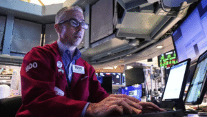 Alphabet Climbs, Tesla Drops as Wall Street Hovers Near Record Highs