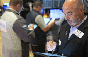 Wall Street Holds Close to Record Highs Amid Uncertainty Over Trump’s Tariffs