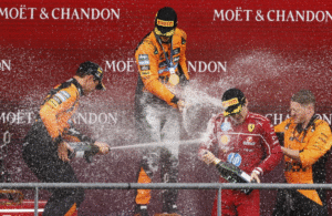Piastri Outpaces Norris to Claim Victory at Rain-Delayed Belgian Grand Prix