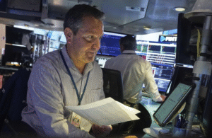 Wall Street Hovers Near Record Highs After Global Market Rally